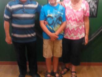 Paul Schuman with his wife and grandson who came from Denver Colorado to visit in July 2015